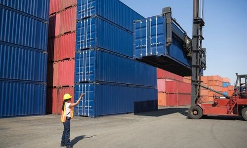 us-woman-at-container-port