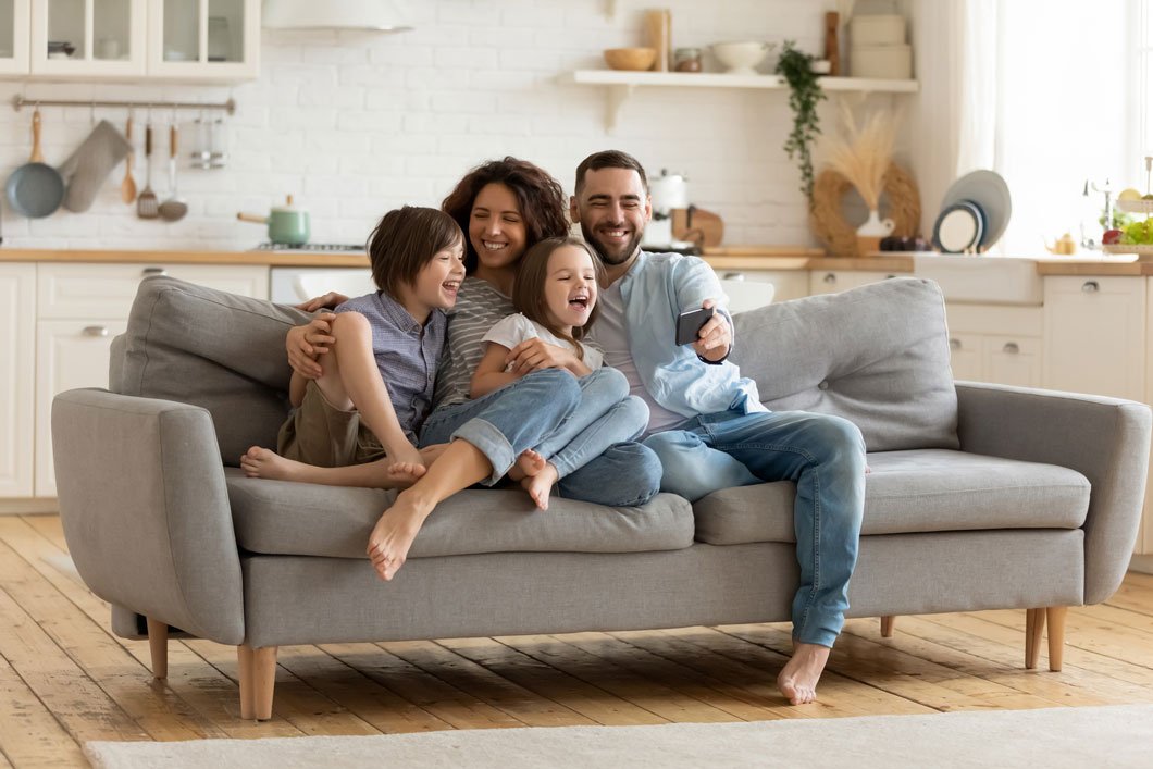 happy-family-on-sofa