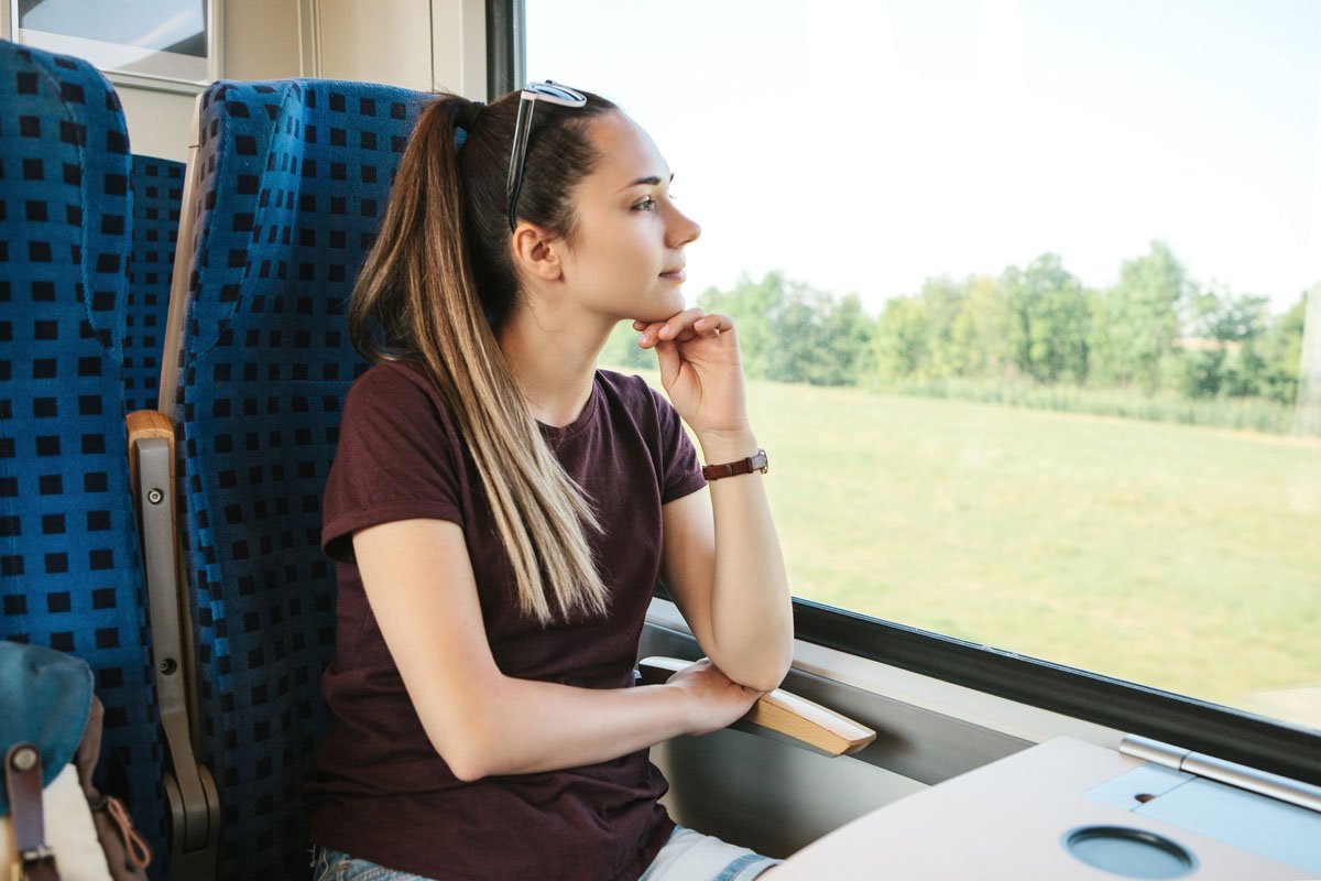 Young female on train in France