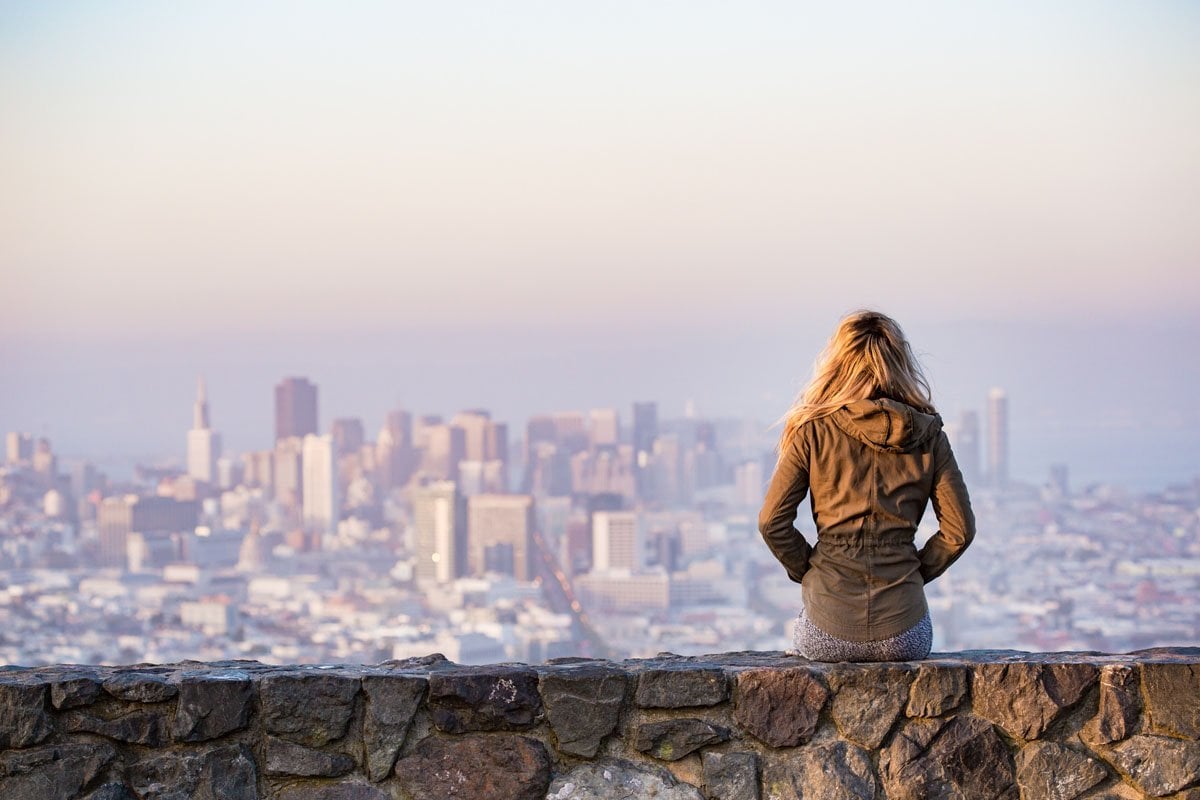 Woman overlooking city